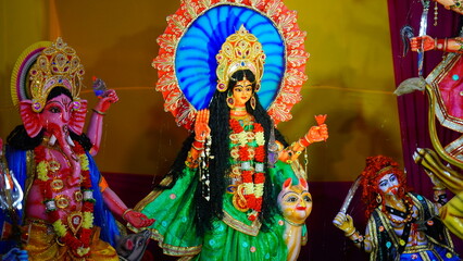 sculpture of goddess durgalaxmi and god ganesha during durga pooja