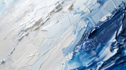 A close up of a blue and white oil painting with a rough texture.