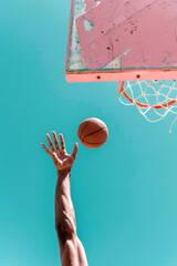 Aiming High: Close-up of a Basketball Shot Under Blue Sky