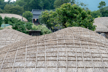View of the thatched roofs in the old rural folk village