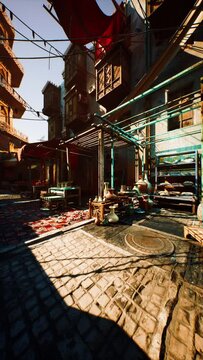 Early morning casts shadows over an old Oriental market, illuminating the cobblestone path and diverse array of goods on display.