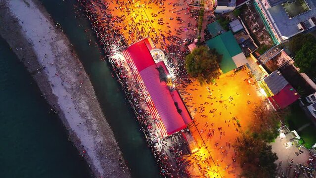 upper view of people gathered on triveni ghat drone shot