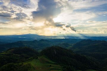 Beautiful sunset and cloudy with green mountain, Natural rainy landscape.