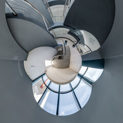 abstractly twisted into spherical 360 panorama interior of modern office with hall staircase and panoramic windows - 795389741
