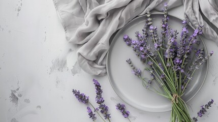 Lavender flowers on a plate with a napkin on a table