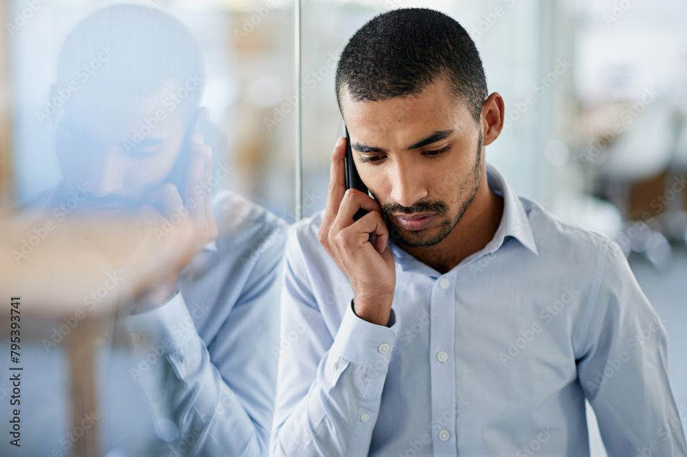 Poster man, listen and phone call in office with news from client in real estate, development and feedback.
