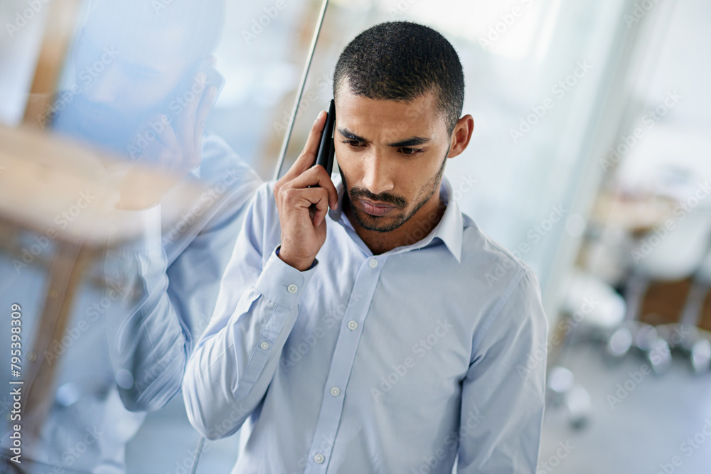 Poster man, listen and phone call in office with news from client in real estate, development and feedback.
