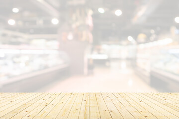 Empty wood table top with supermarket blurred background for product display - 795400769