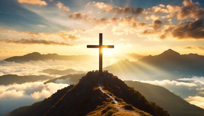 holy cross on top of mountain at sunset or sunrise symbolizing the death and resurrection of jesus christ hill is shrouded in light and clouds horizontal background religion christianism concept