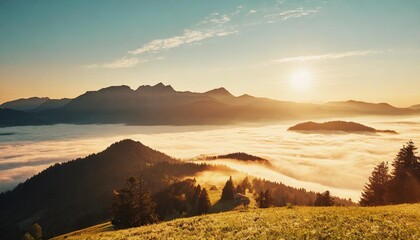view from mt auerberg at sunrise valley full of fog the alps behind bavaria germany