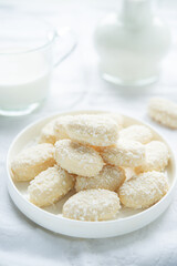 Homemade coconut candies in a plate.