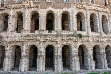 Beautiful close up view of the ancient facade of open-air Theatre of Marcellus (Teatro di Marcello) in sunny day, Rome, Italy