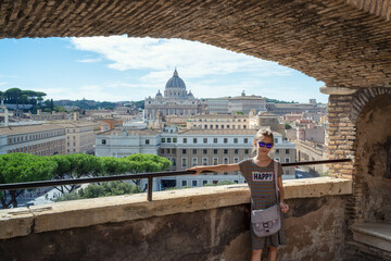 Little girl enjoying the view from the terraces of Sant'Angelo castle overlooking St Peter's...