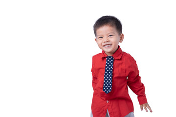 A little boy wearing a suit stands looking at something interesting. Cute expression. Funny, happy....