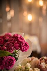 bouquet of pink roses at a party close-up