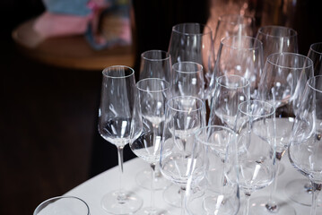 Glass glasses at an event. Catering and table setting for weddings and birthdays