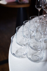 Glass glasses at an event. Catering and table setting for weddings and birthdays