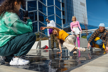Vibrant Scene Capturing A Diverse Group Of Young Adults Engaging In Dance Moves On A Reflective...
