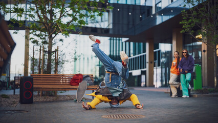 Dynamic Urban Scene Capturing A Young Male Breakdancer Performing An Inverted Move With Onlookers...