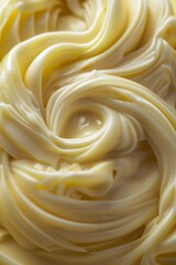 Lose yourself in the creamy swirls of liquid mayonnaise, its subtle fragrance and smooth consistency inspiring calm