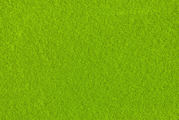 Green carpet texture, plain relief background. Grass, lawn
