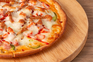 Pizza topped with bamboo worm, pupa, silkworm edible insect crispy mixed with sausage slices, sweet pepper and mozzarella cheese, Fried insects are the most widely sold street food in Thailand.