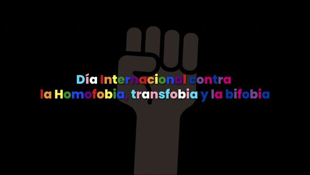 D&iacute;a Internacional contra la Homofobia, la Transfobia y la Bifobia, texto en fondo negro con mano. 