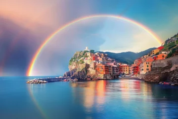 Vibrant rainbow over a coastal town © Cloudyew