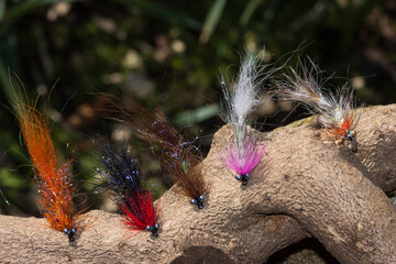  Selection of colorful coastal flies for sea trout fishing.