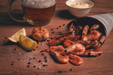 Fried shrimp in a paper bag, shrimp for beer, in a newspaper, on a wooden table, no people,