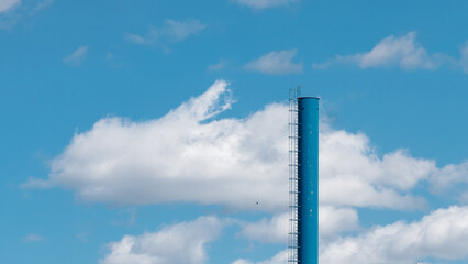 metal chimney against the sky  - 795505150