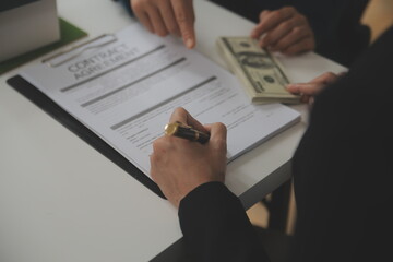 Business Signing a Contract Buy - sell house, insurance agent analyzing about home investment loan...