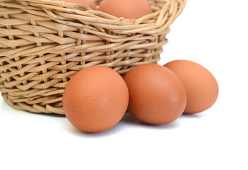 Eggs isolated in basket on white background