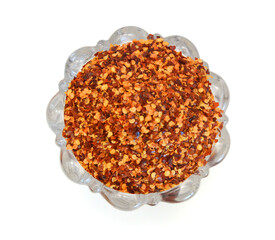 Chili flakes on white background