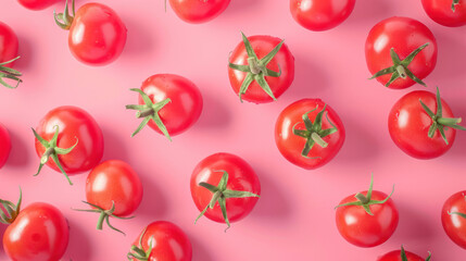 Bunch of red tomatoes on pink surface