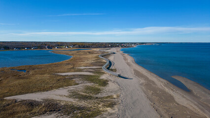 Aerial Drone View Of A Beautiful Beach and Boardwalk On The Coast Of The Atlantic Ocean in...