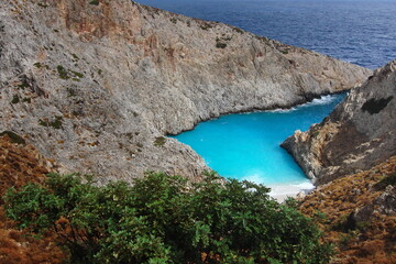 Fototapeta premium Picturesque sea bay with turquoise water in the rocks on the island of Crete