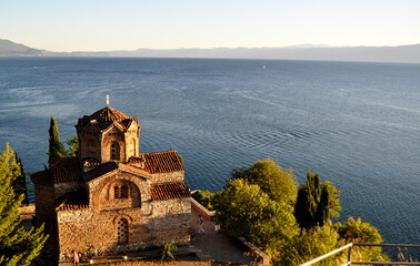 Historic Church of Saint John the Theologian, situated on the cliff over Kaneo Beach overlooking...