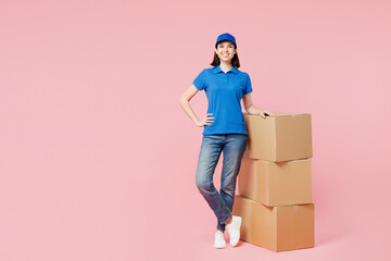 Full body delivery girl employee woman wear blue cap t-shirt uniform workwear work as dealer...