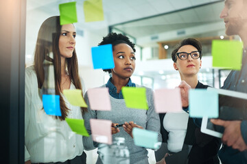 Office, training and glass wall for notes, planning and erp meeting with tablet for report. Man, woman and team for small business, teamwork and collaboration for partnership or b2b project or talk