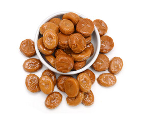 Caramel candies isolated on white background