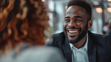 Smiling Man Enjoying Conversation