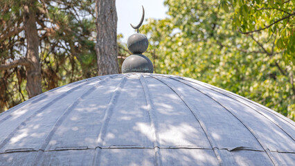 Half Crescent at Aluminium Dome Ottoman Thomb Damat Ali Pasha Turbeh - obrazy, fototapety, plakaty