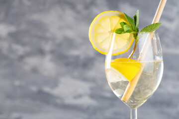 Hugo Spritz Cocktail Made with Sparkling Wine, Lemon, Mint and Elderflowers Syrup