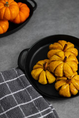 Pumpkin Shaped Bread. Autumn, Styled Composition with Neutral Colours.