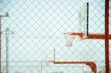 Basketball field with a fence around it