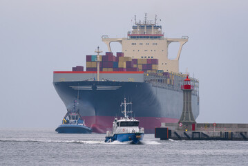 MARITIME TRANSPORT - Container ship sails to the seaport