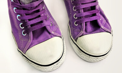 Old lilac sneakers, close-up