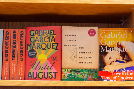 Close-up of Gabriel Garc&iacute;a M&aacute;rquez's Until August novel on a bookshelf in the bookstore.