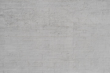 Unevenly plastered old wall. Abstract construction background